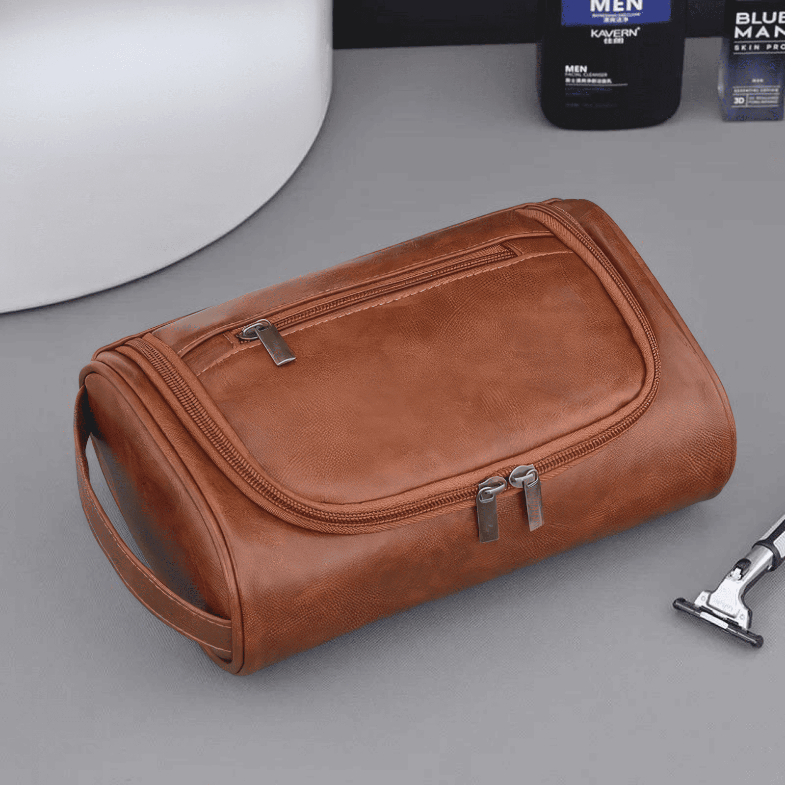 Petite trousse de toilette homme simili cuir marron clair avec poignée latérale
