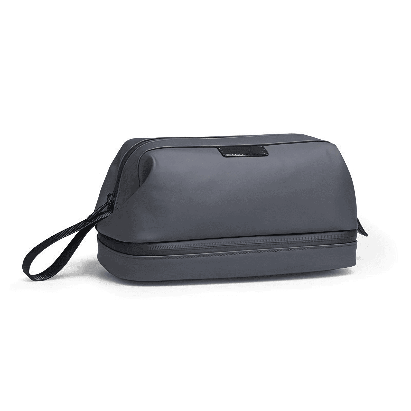 Trousse de toilette homme haut de gamme grise vue de côté avec poignée latérale et base zippée pour un rangement optimal.