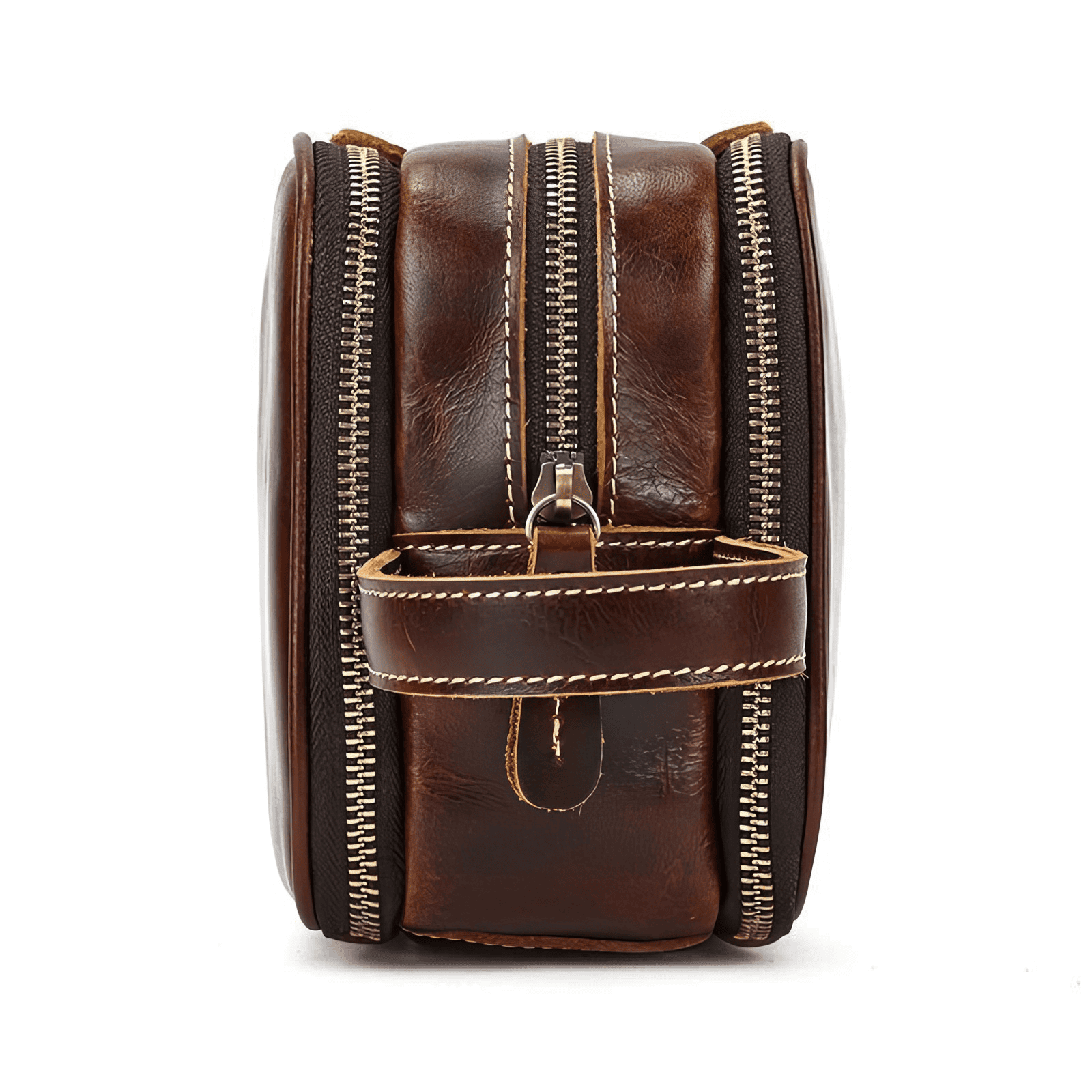 Trousse de toilette homme cuir luxe marron rouge vue latérale, poignée robuste et doubles fermetures dorées visibles.