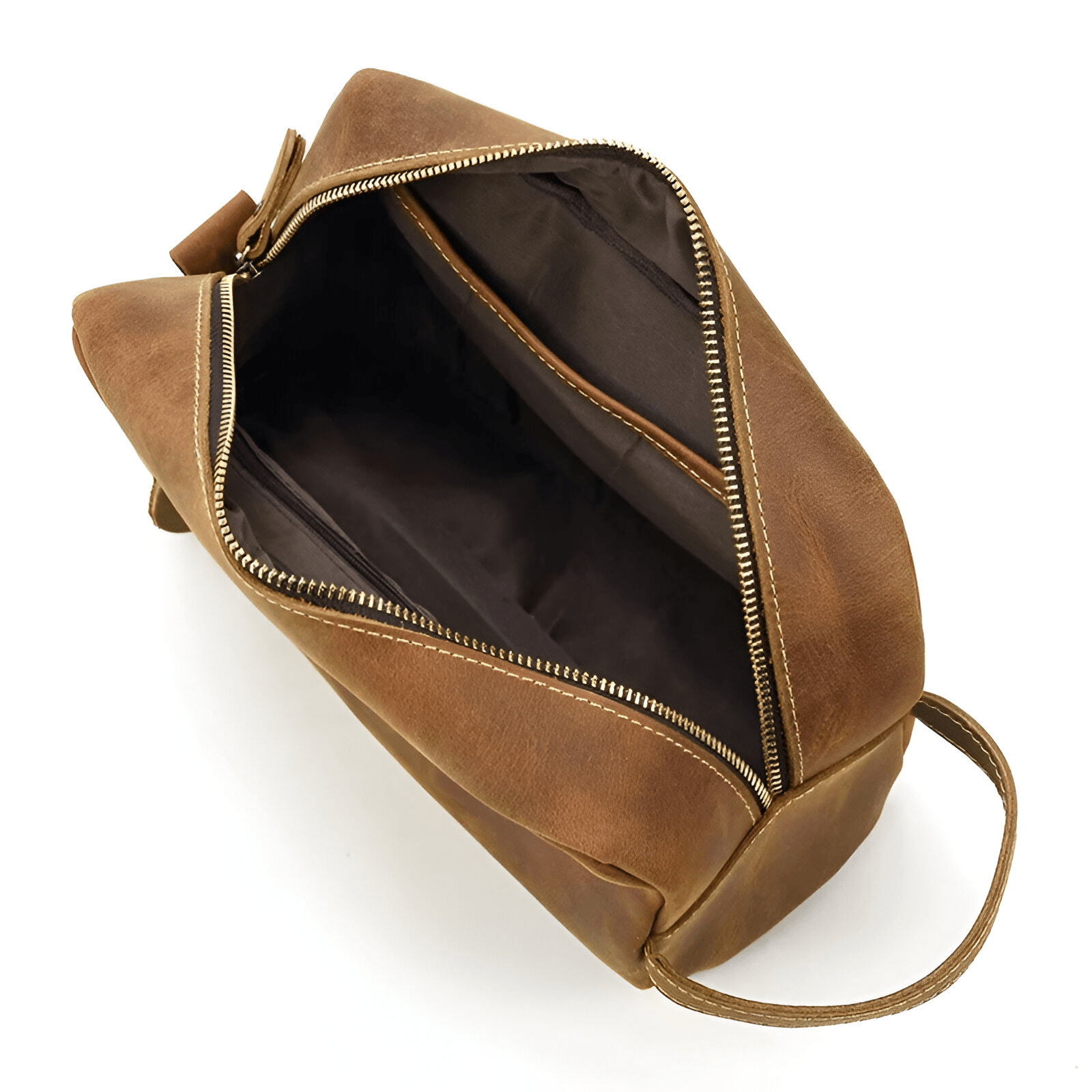 Trousse de toilette homme en cuir marron vue de l’intérieur vide avec doublure en tissu